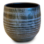 WHITE ORCHID IN ROUND DAHN BLUE-BROWN CERAMIC POT - أوركيد أبيض في حوض سيراميك دائري