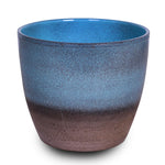 WHITE ORCHID IN ROUND OCEAN BLUE CERAMIC POT - أوركيد أبيض في حوض سيراميك دائري بلون الأزرق