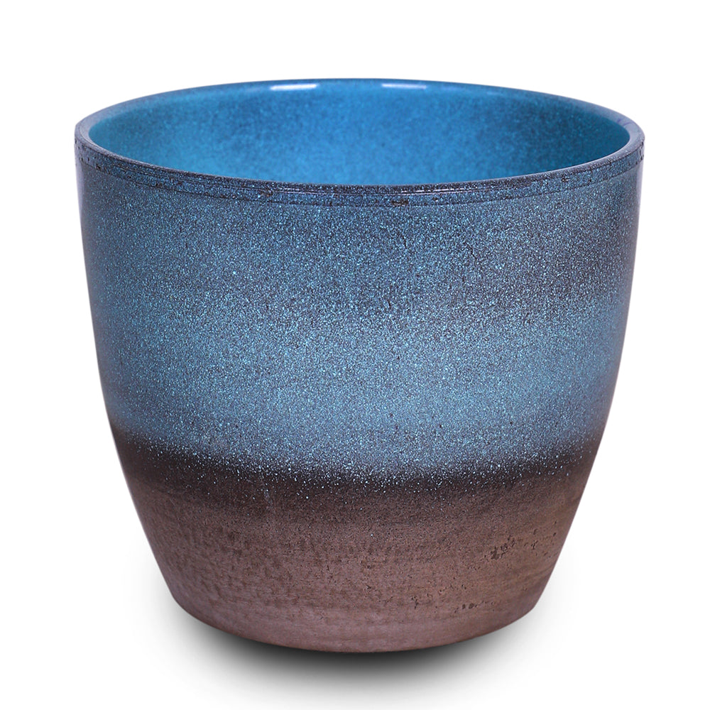 WHITE ORCHID IN ROUND OCEAN BLUE CERAMIC POT - أوركيد أبيض في حوض سيراميك دائري بلون الأزرق